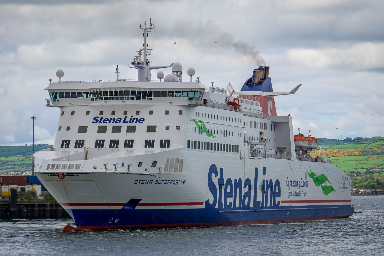 STENA SUPERFAST VIII swings off the berth at Belfast Victoria Terminal 4 (North) at the start of another routine crossing to Cairnryan. Copyright © Steven Tarbox.