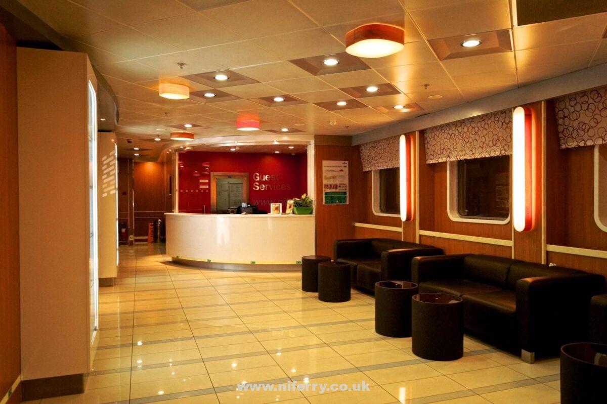 Stena Mersey entrance lobby with guest services desk. The onboard shop is to the left of the picture.  © Niferrysite