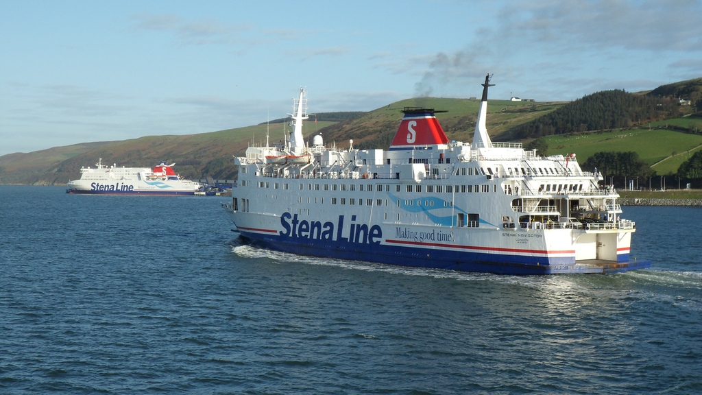 Old and New(er)! STENA NAVIGATOR approaches one of the ships which was to replace her, STENA SUPERFAST VII, seen here berthed at Loch Ryan Port. Coincidentally, STENA NAVIGATOR had been displaced on the Dover - Calais route by another Superfast VII class ship, SEAFRANCE MOLIERE, the former Superfast X and present STENA SUPERFAST X. Copyright © Scott Mackey.