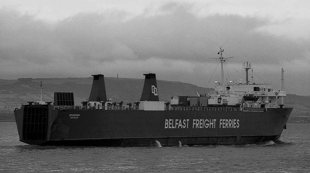 Belfast Freight Ferries Spheroid in Belfast Lough with the Knockagh Monument.visible in the background between her funnels. Copyright © Alan Geddes.