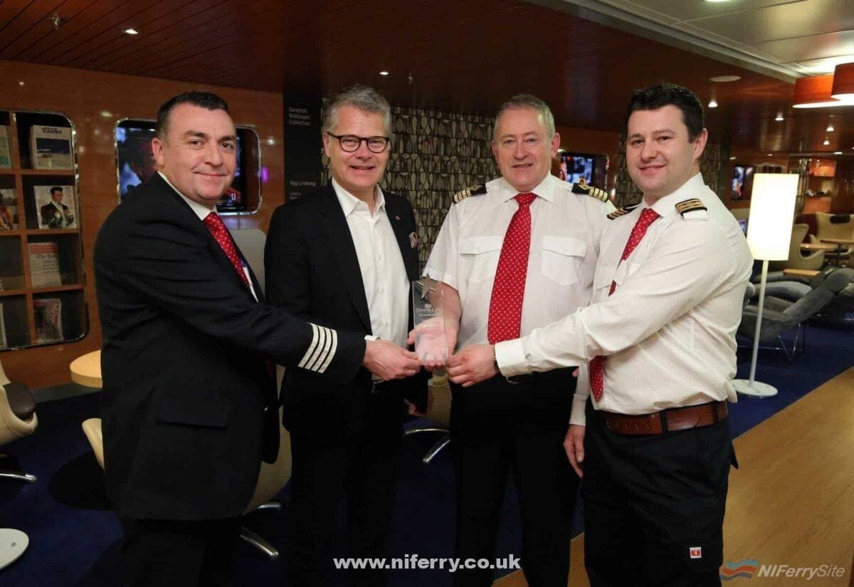 Stena Line CEO Niclas Martensson presented the team on Stena Superfast VIII with the Scandinfo trophy for 2017.  Pictured with Niclas are, Senior Master George Combe (2nd from right), Onboard Sales & Services Manager Norris McLean (left) and Chief Engineer Conor Murphy (right) with the much sought-after trophy. Stena Line