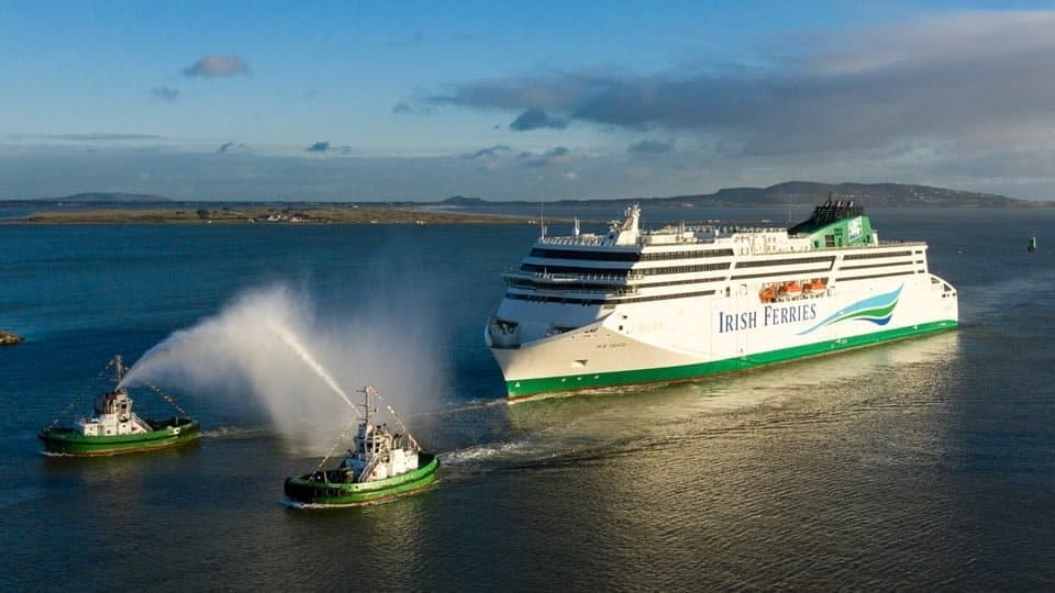Irish Ferries W.B. YEATS arrives in Dublin Port for the first time, Thursday 20th December 2018, greeted by a water 'salute' from two of the port tugs. Copyright © Irish Ferries.