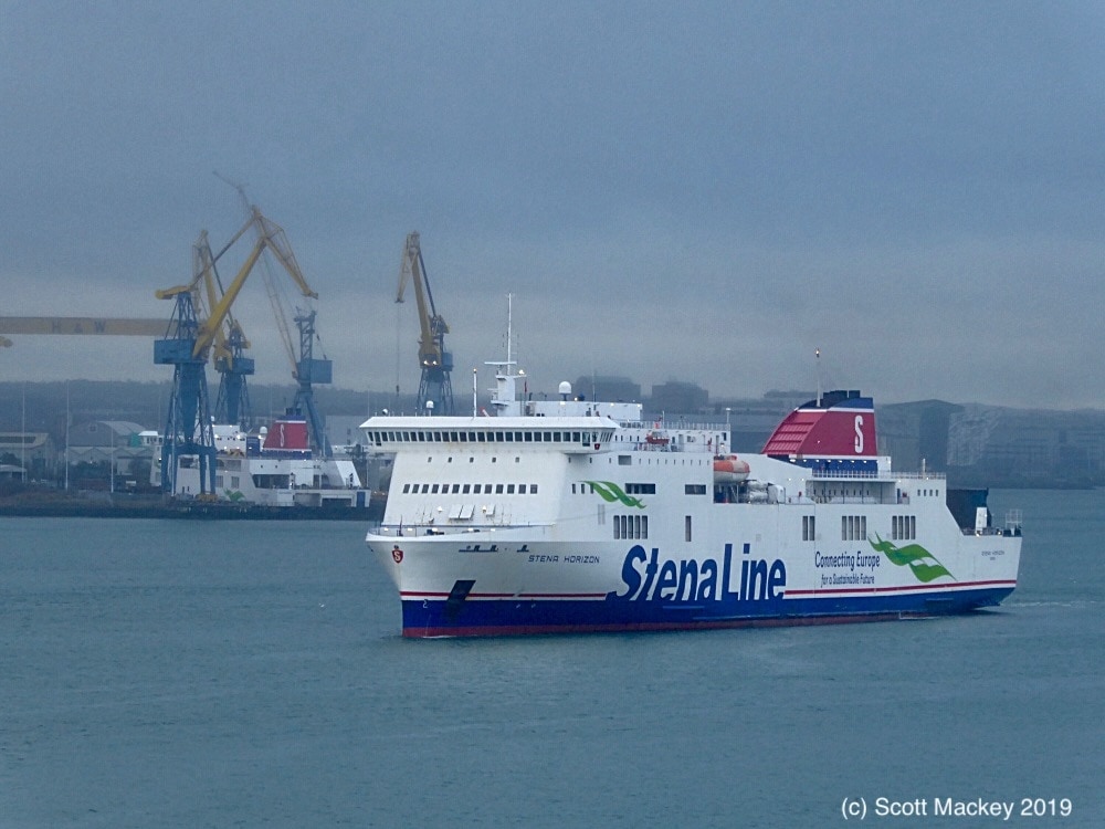 STENA HORIZON leaves Belfast on her final crossing to Birkenhead as 2019 refit relief vessel for STENA LAGAN and STENA MERSEY, 25.01.19. STENA MERSEY can be seen in the background in Belfast Dry Dock. Copyright © Scott Mackey.