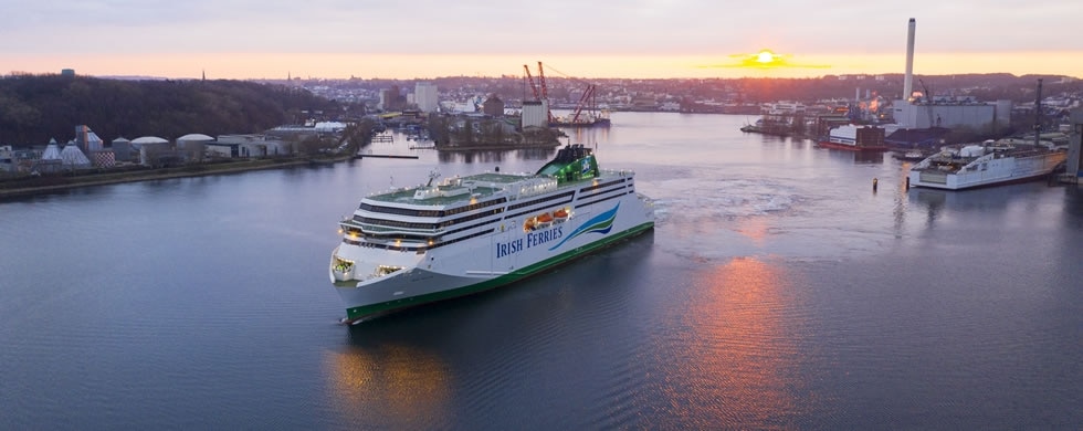 Irish Ferries W.B. YEATS depart Flensburg for her delivery voyage to Ireland with the FSG shipyard in the background. Irish Ferries.