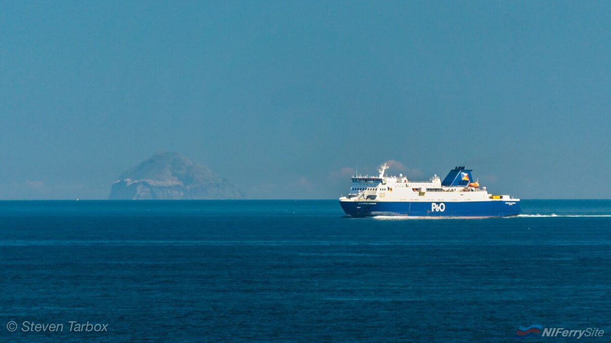 P&O Ferries EUROPEAN CAUSEWAY seen in the sun bound for Larne on her 11:30 sailing from Cairnryan, with Ailsa Craig in the background. 27.06.19. Copyright © Steven Tarbox.