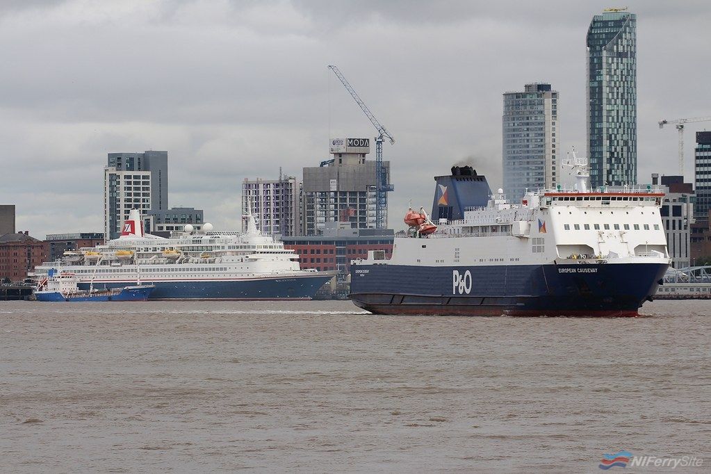 P&O Ferries EUROPEAN CAUSEWAY arrives at Cammell Laird Birkenhead for her second dry docking of the year, 03.09.19. Fred Olsen's BLACK WATCH is seen in the background receiving bunkers. Copyright © Das Boot 160 Photography.