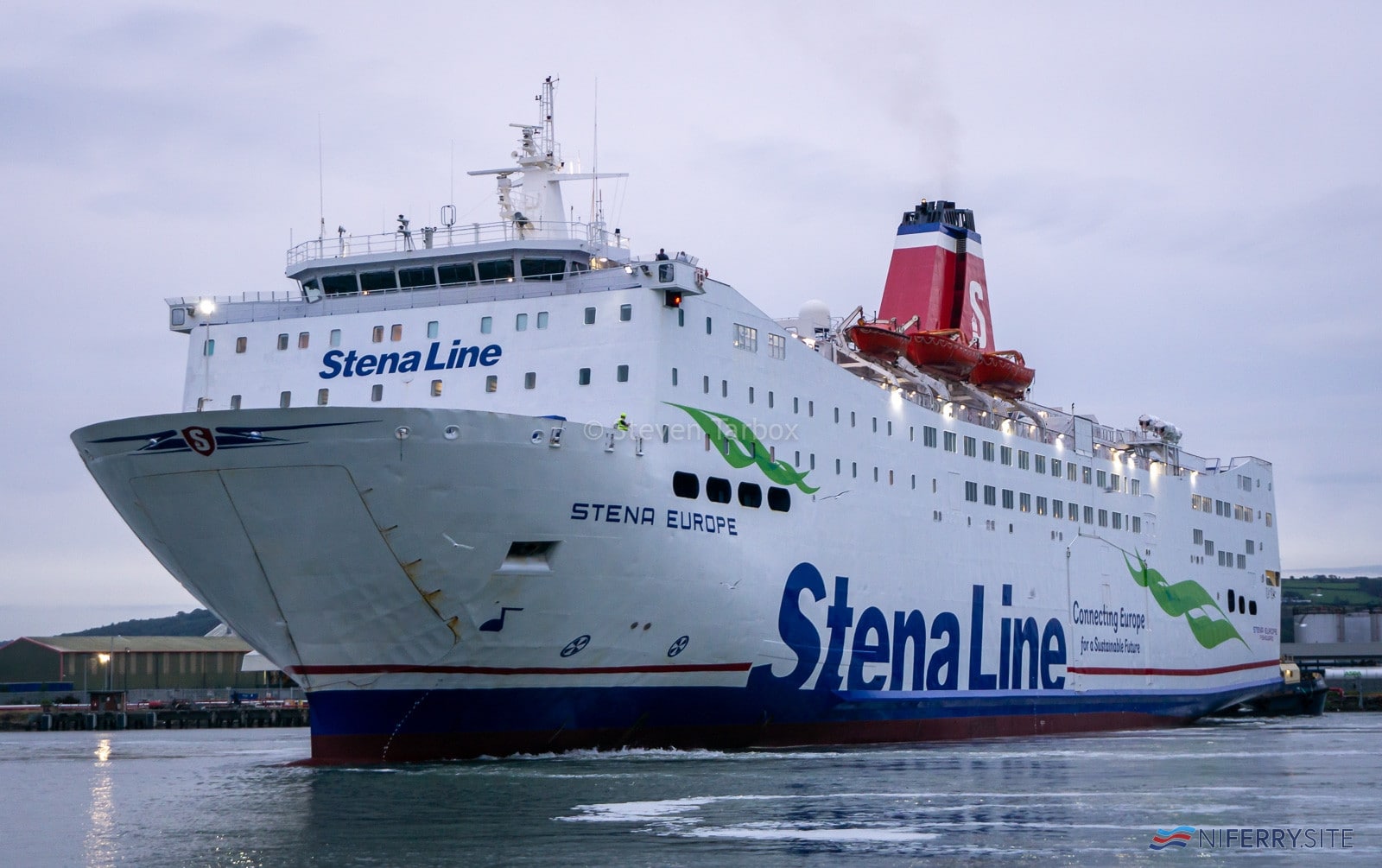 STENA EUROPE swings with the assistance of SVITZER SUSSEX outside Belfast Building Dock having just left the facility following her annual dry-docking. Copyright © Steven Tarbox.