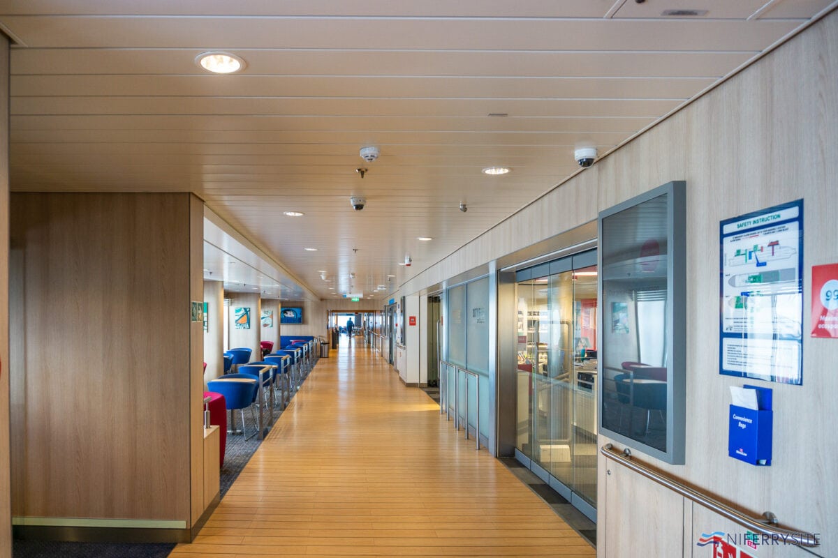 One of the wide corridors onboard STENA ESTRID, running from Barista to the Taste restaurant passing the shop. © Steven Tarbox.