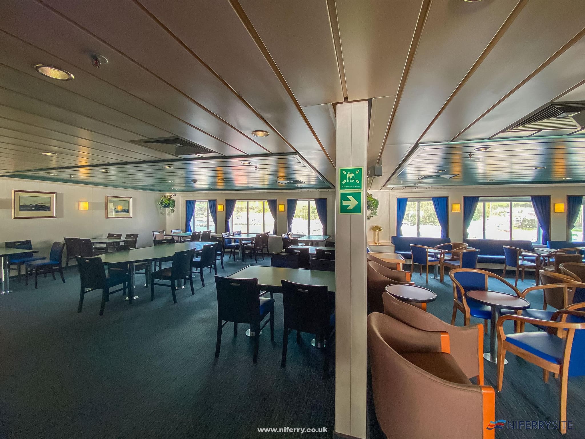 The lounge area onboard NORBAY and NORBANK is split into two.  Here we see the starboard side of NORBAY with restaurant seating to the left and bar seating to the right.  Image: © Steven Tarbox.